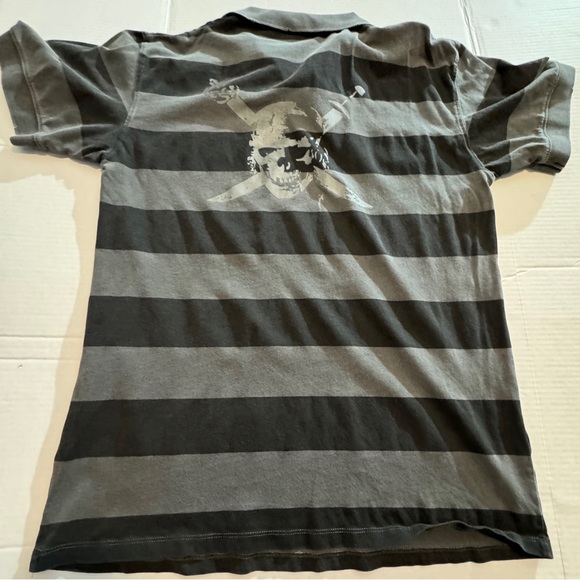 NWOT Men’s distressed Pirates of the Caribbean polo from Disneyland. - Picture 2 of 12